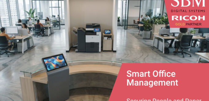 A high-angle, photorealistic view of a modern corporate office, showing a digital visitor kiosk at the reception desk in the foreground and an enterprise printer in the inner office background.